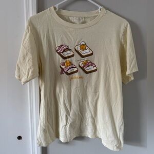 EUC Uniqlo Gudetama Graphic T-Shirt in Cream Yellow